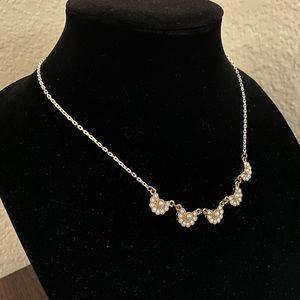Gold and white necklace with pearl accent